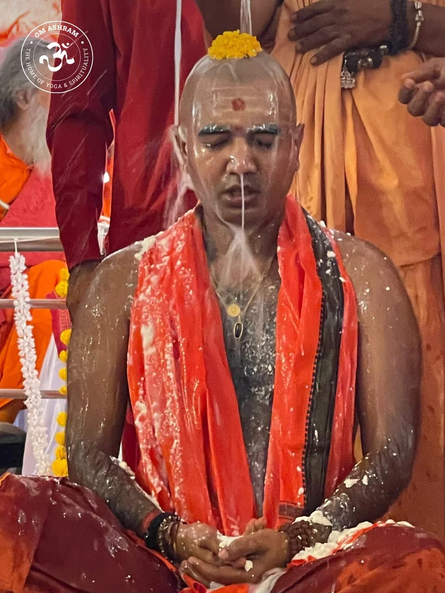 Sacred abhisheka ritual of Pujya Swami Avatar Puri Ji Maharaj during Mahamandaleshwar Pattabhishek ceremony Rajasthan.